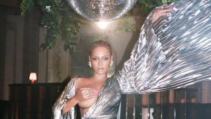 Beyoncé Celebrated the Release of Her New Album in a Liquid Silver Gown and Thigh-High Stockings