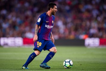Download Lionel Messi 2020 Kicking Soccer Ball Wallpaper | Wallpapers.com