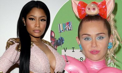 Nicki Minaj raps about her and Miley Cyrus' MTV VMAs feud on Yo Gotti's 'Down in the DM' | Daily Mail Online