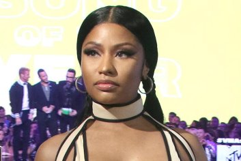 Nicki Minaj Is Back on the Crocs Train in a Cutout Swimsuit & Chanel-Adorned Clogs