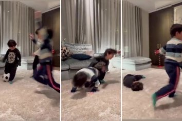 Watch Lionel Messi's son Mateo, 6, WIPE OUT three-year-old brother Ciro in living room kickabout to make Antonela wince | The US Sun