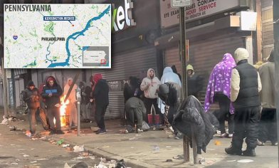 Philadelphia's Skid Row: Video shows city's homeless crisis with dozens camped around trash bin fire | Daily Mail Online