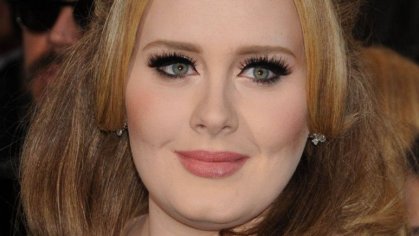 Adele showcases weightloss on magazine cover, says she'll 'absolutely' marry boyfriend