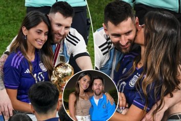 Lionel Messi's wife Antonela Roccuzzo kisses him after World Cup
