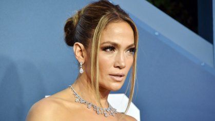 Jennifer Lopez Wears Intricate Updo Hairstyle and Bejeweled Headband â See Photo | Allure