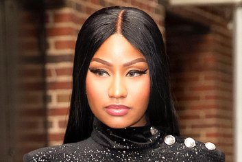 Nicki Minaj Elevates Her Plunging Bathing Suit With Unexpected Feather-Coated Gold Heels