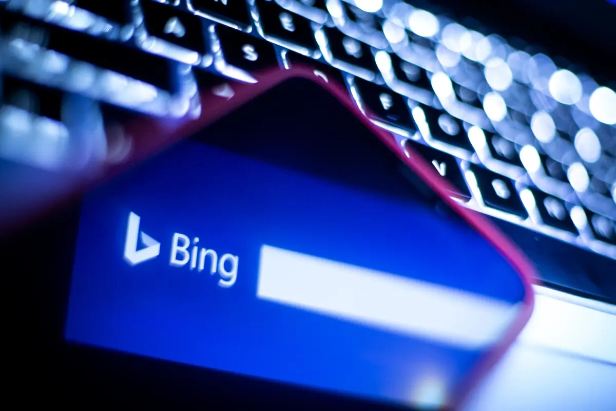 Smartphone with Bing search engine design next to keyboard
